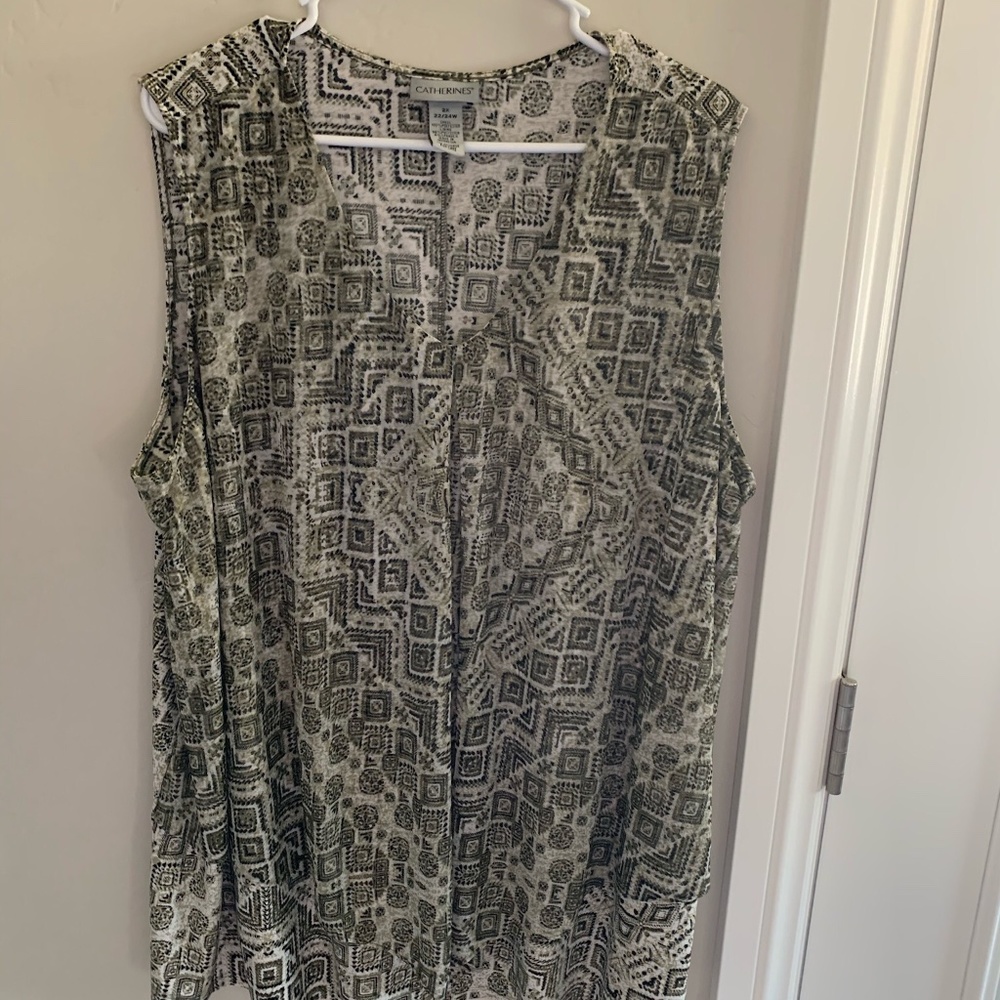 Olive, tan, black sleeveless tunic.